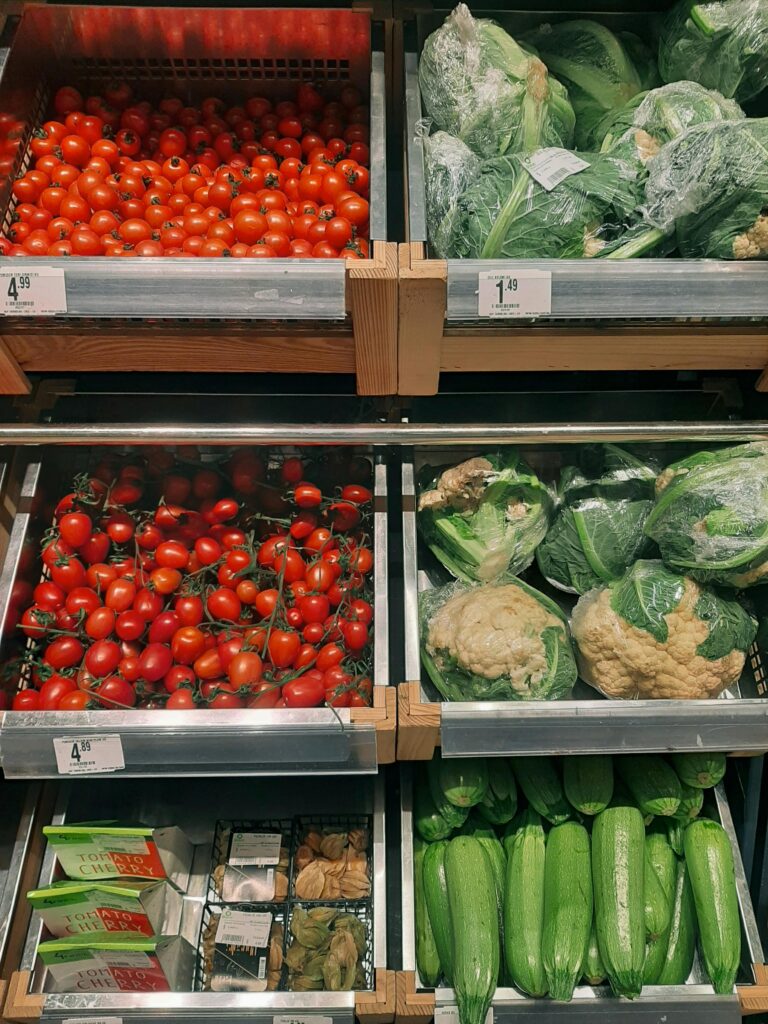 Fresh produce at a farmers market, showcasing affordable and local food options for budget-conscious travelers